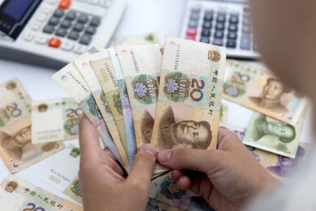 BUZZ-COMMENT-China's bond buys may kill three birds with one stone